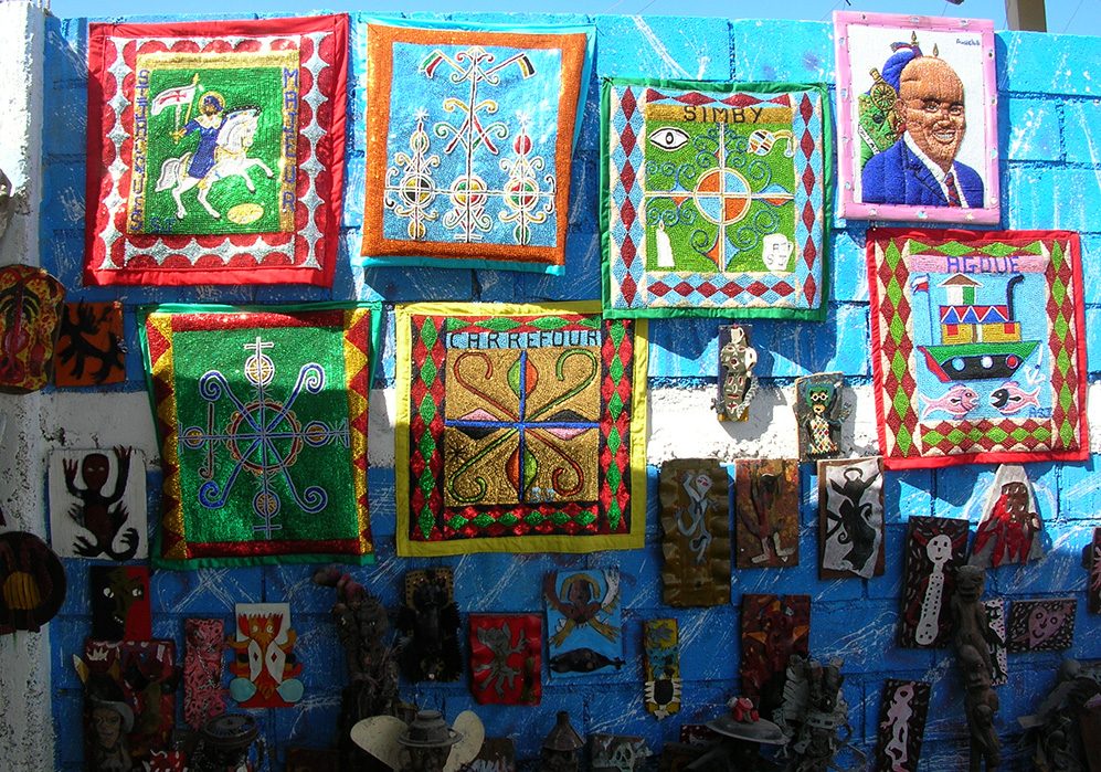Haitian drapo and mixed-media paintings