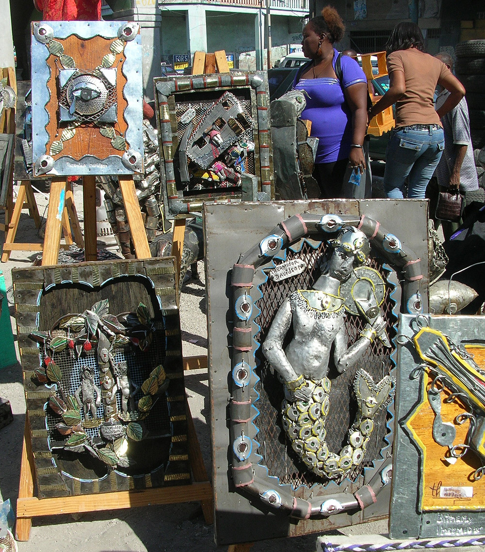 Mixed-media paintings at the 2nd Ghetto Biennale