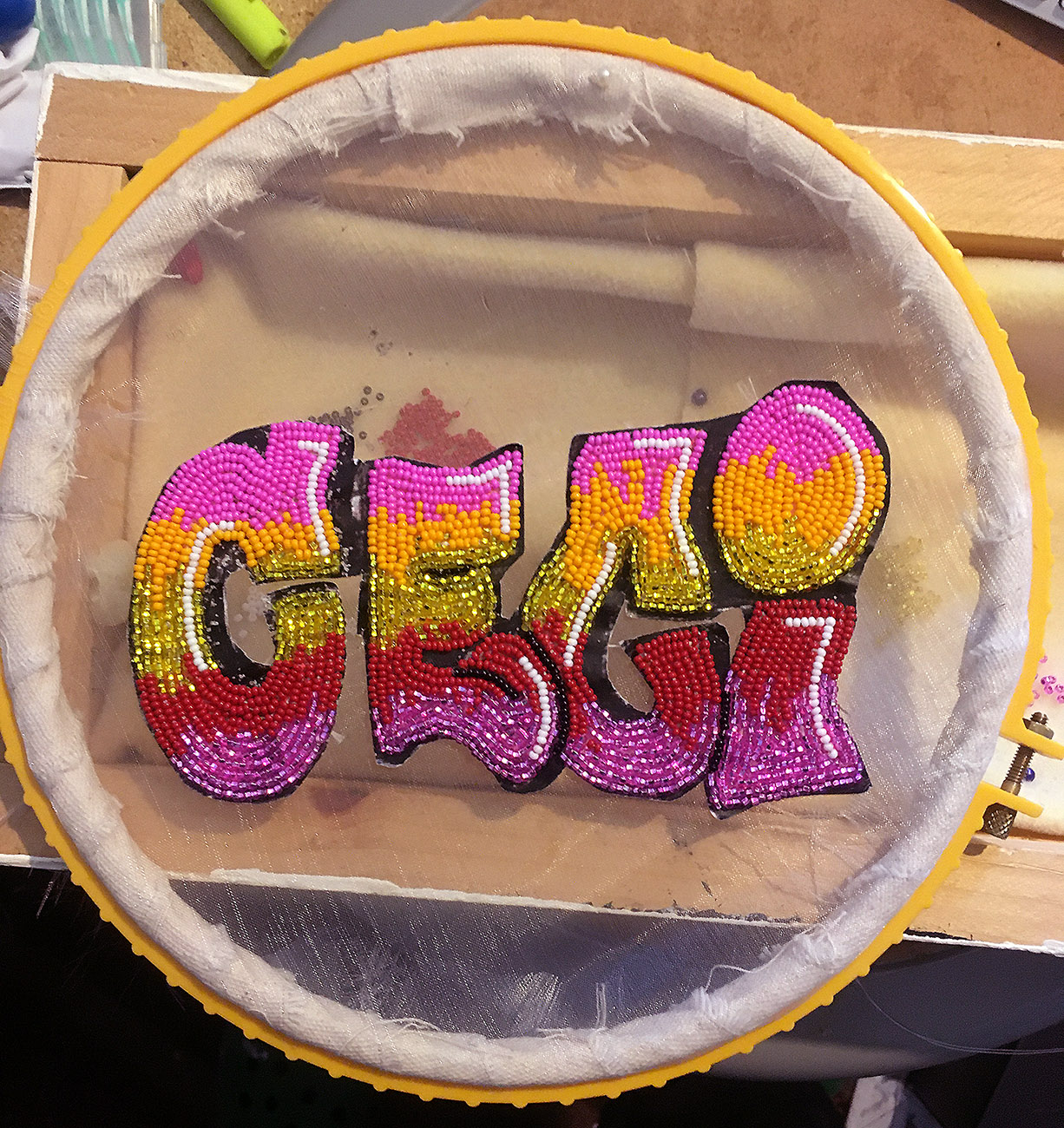 Beaded graffiti of the French word 'ceci'